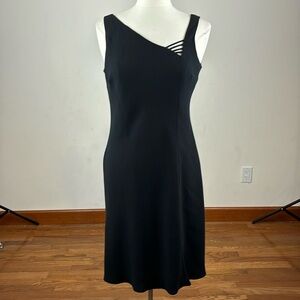 Jones wear lined, sleeveless sheath black dress. Women’s size 8